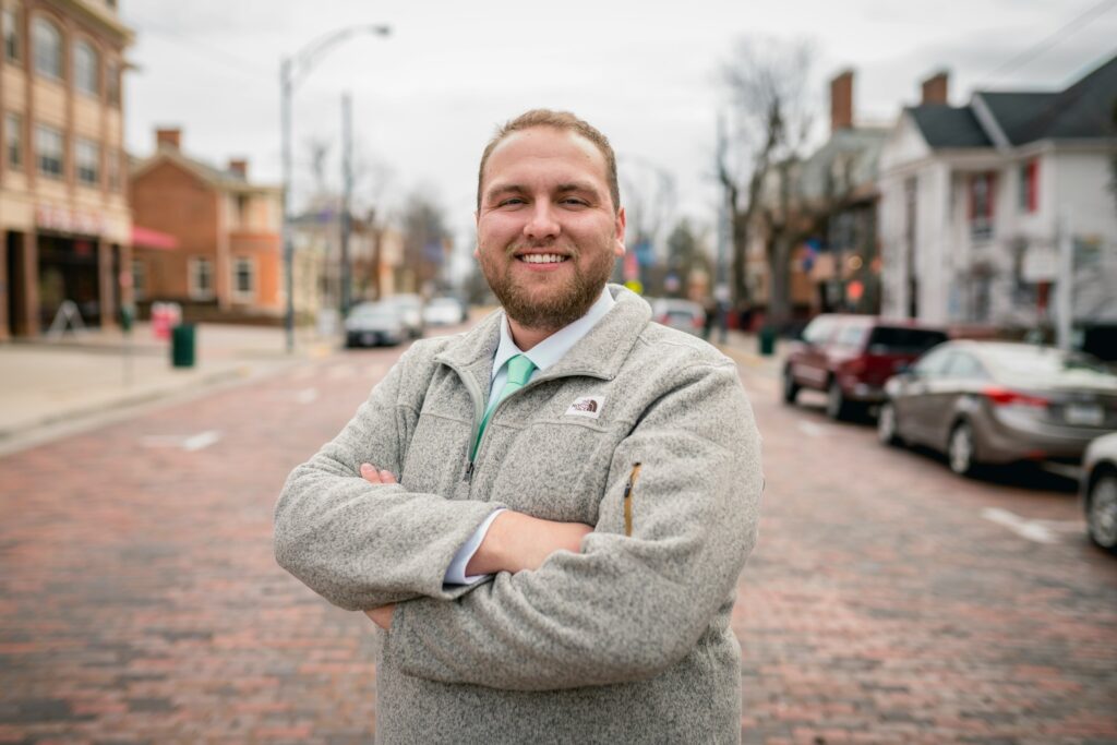 Portrait of a smiling bearded man outdoors