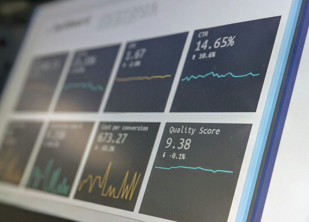 MacBook screen displaying a bar graph analytics report